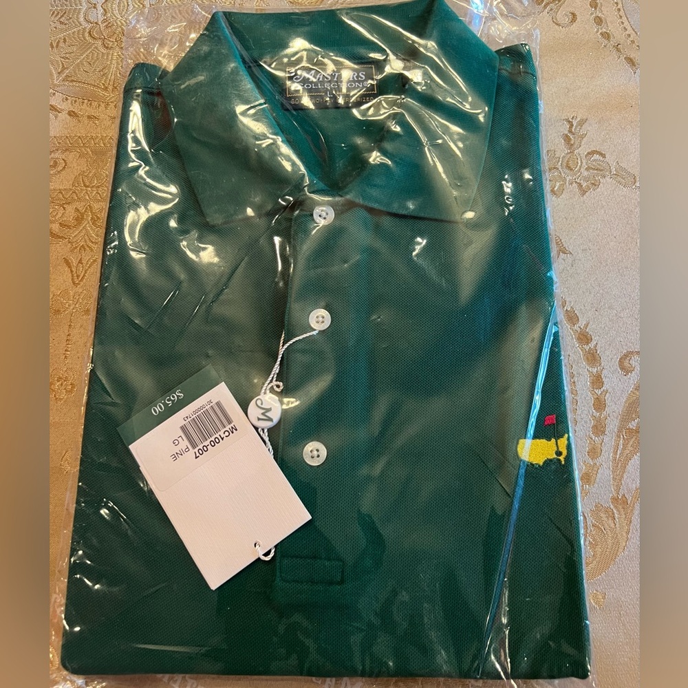 Masters pine  green polo shirt.  Large 100 % Pima cotton.  New in package